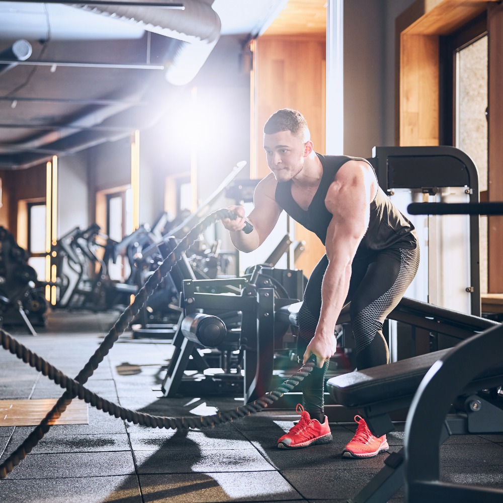 "Person performing high-intensity interval training (HIIT) to burn fat quickly."