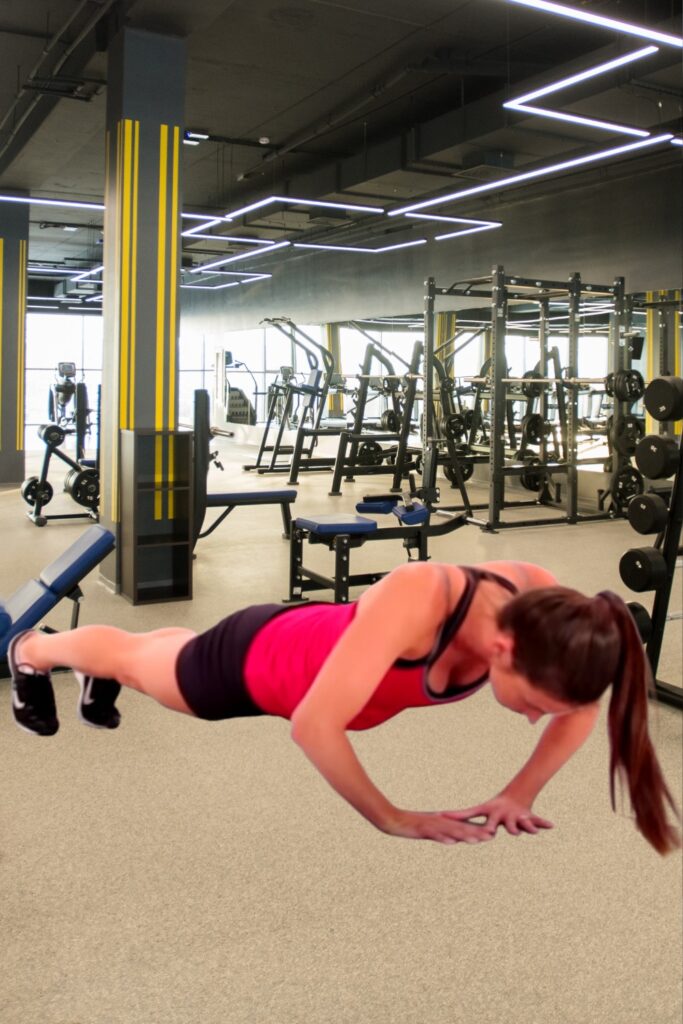 "Woman doing diamond push-ups on the floor to isolate and strengthen the triceps."