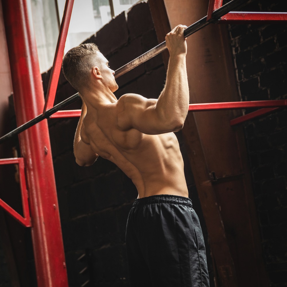 A person doing a pull-ups exercise