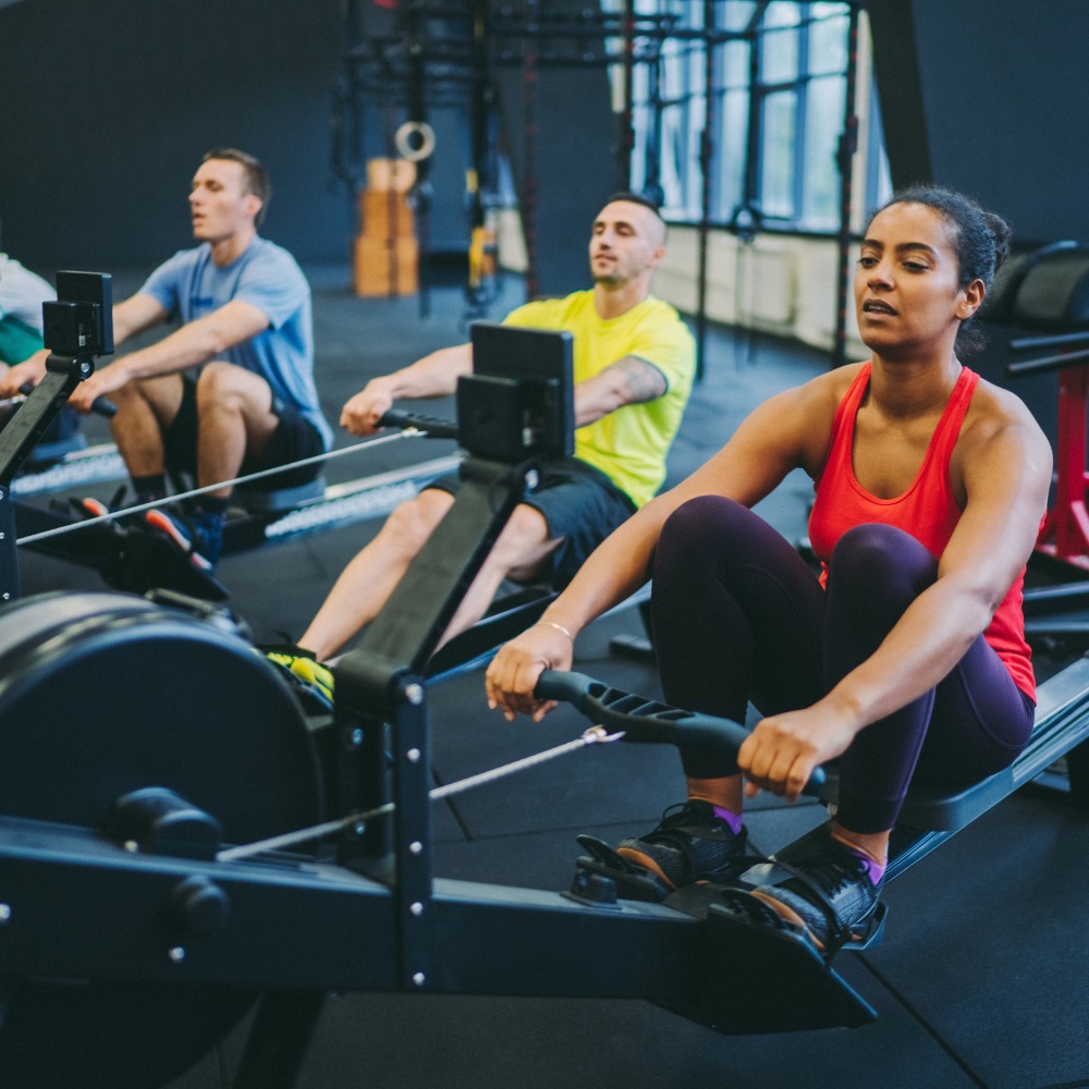 A person doing a rowing machine exercise