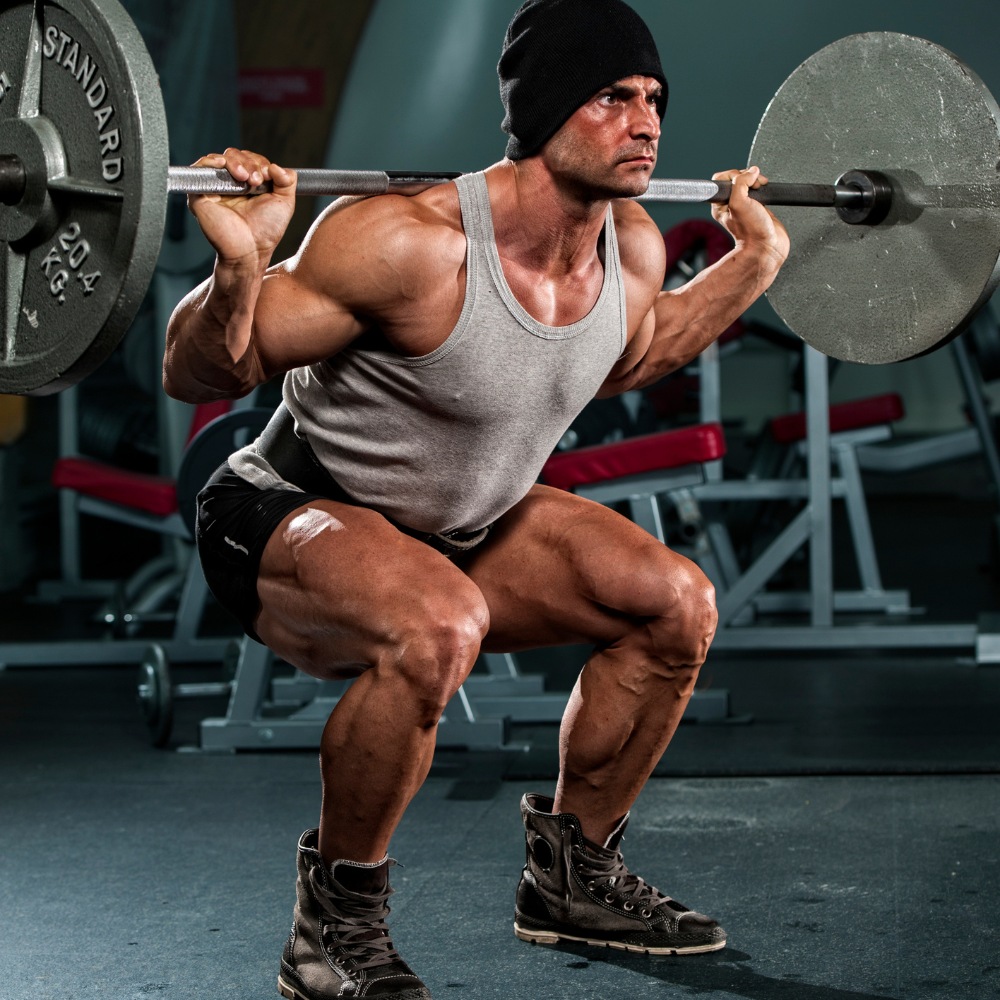 A person doing squat exercise