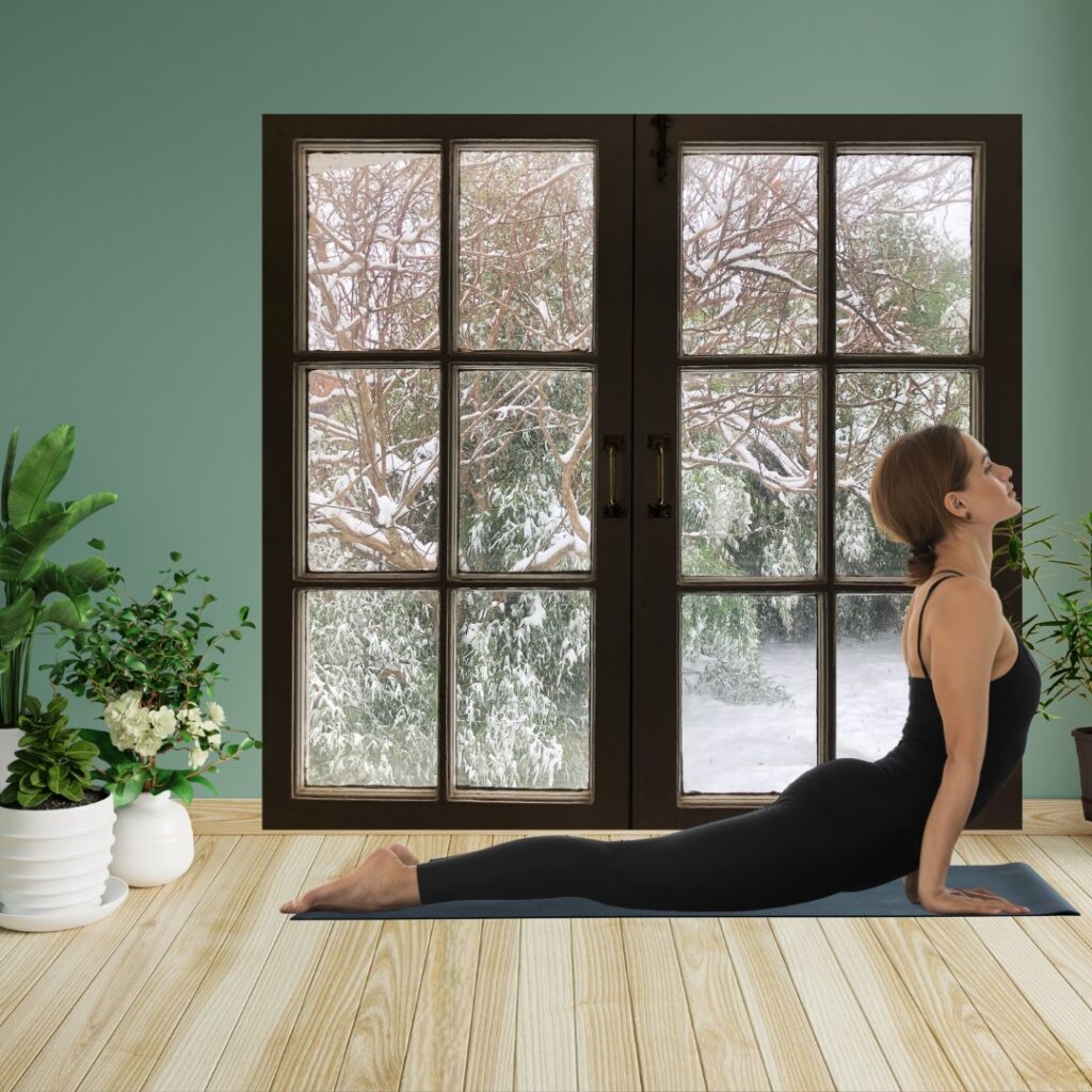 Person stretching in a bright living room to promote mental well-being.