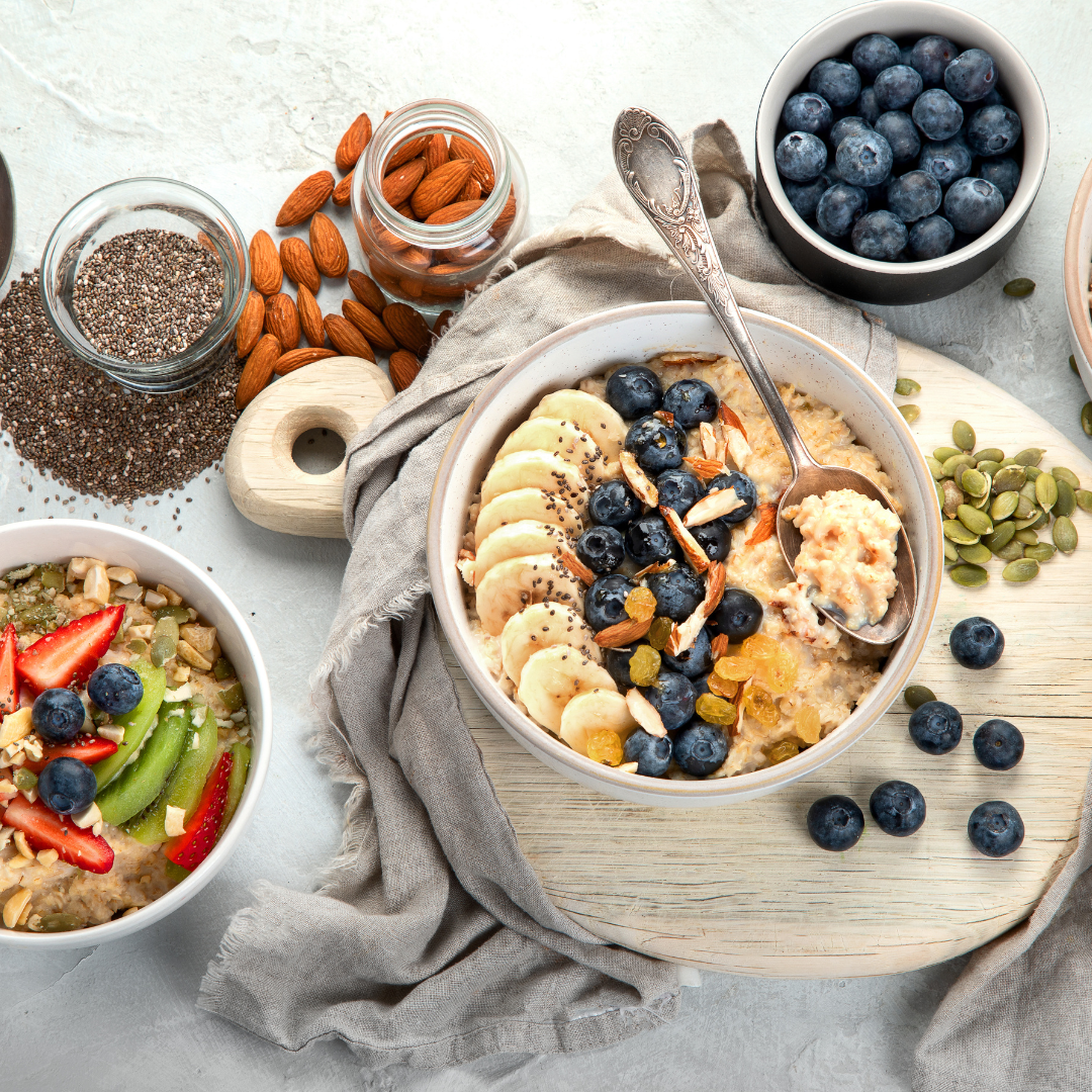 A nutritious bowl of oatmeal topped with fresh berries and nuts.