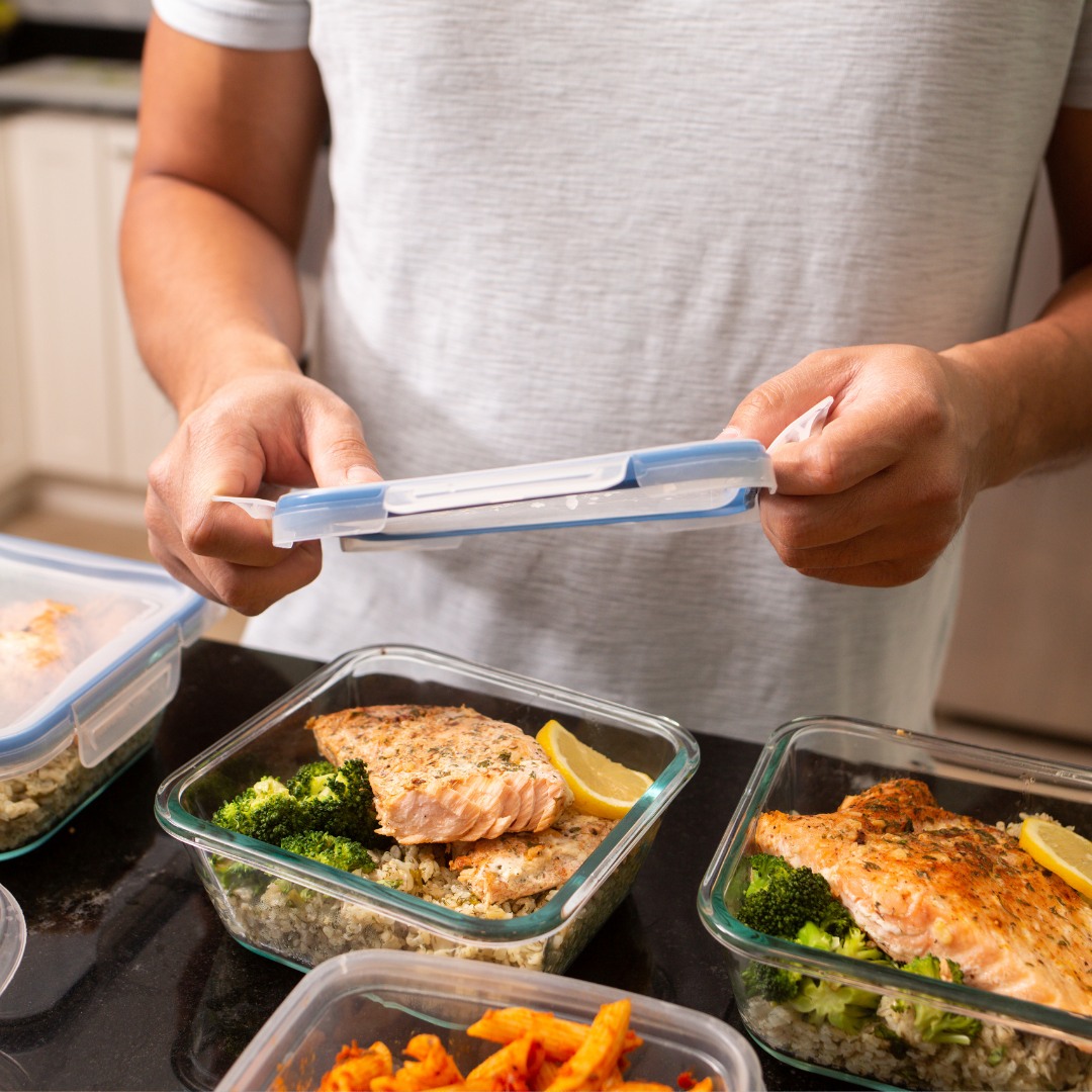 Organized kitchen counter with meal prep containers, demonstrating the importance of meal planning for healthy eating