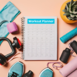 Customizable workout planner with fitness gear on a bright surface, symbolizing motivation and health planning.