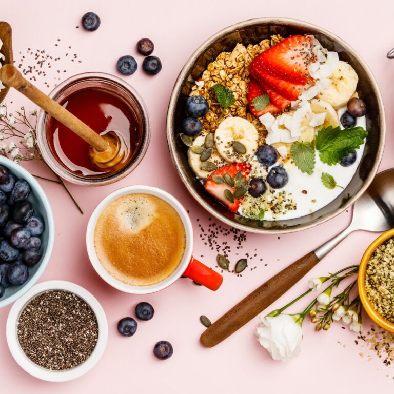 Healthy breakfast bowl with chia pudding, berries, and nuts."