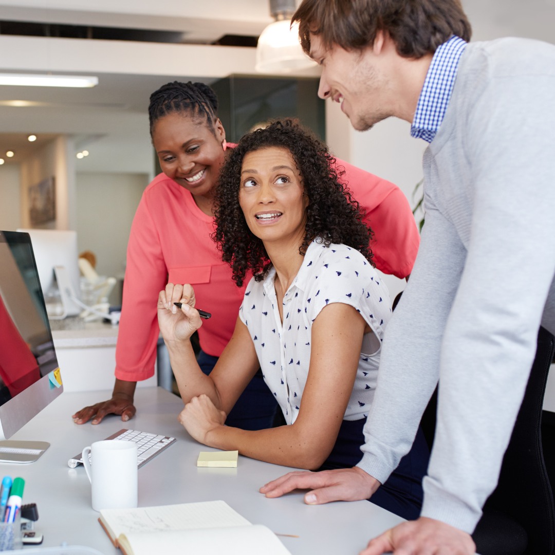 A group of people collaborating and smiling, symbolizing the power of community in balancing productivity and self-care. A well-organized daily planner with tasks and self-care activities, illustrating a balanced approach to productivity.