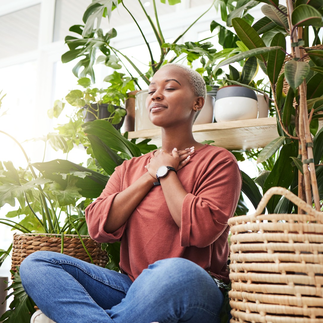 A person meditating in a peaceful garden, emphasizing mindfulness and relaxation. A person meditating in a peaceful garden, emphasizing mindfulness and relaxation