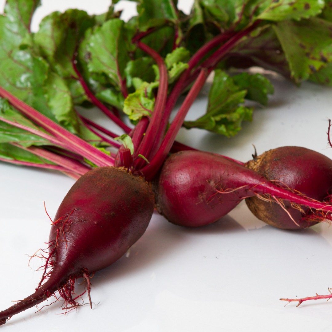 Fresh beets, a natural performance booster, offering vivid color and health benefits for cardiovascular health and detoxification."