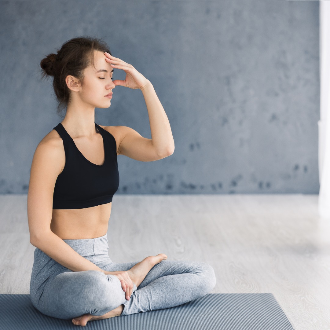A calm, meditative setting where an individual practices visualization techniques to enhance self-confidence. A calm, meditative setting where an individual practices visualization techniques to enhance self-confidence.